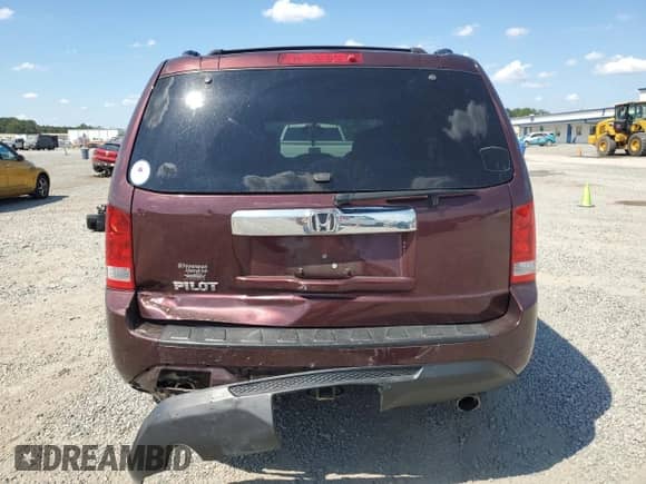 2014 Honda Pilot EX z VIN 5FNYF3H41EB021295, wystawiony jako Copart lot #68940065 z przebiegiem 155 697 mil mil oraz Szkoda całkowita • Salvage title. Historia ofert i sprzedaży dostępna na DreamBid. Obrazek 6.