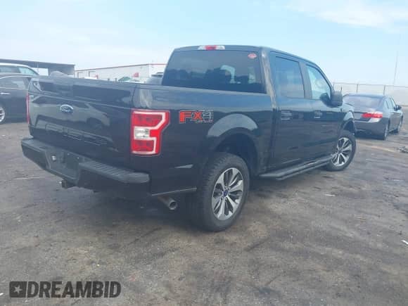 2019 Ford F-150 XL with VIN 1FTEW1E54KFB76726, listed as a IAAI auction lot 42970886 with 128,574 mi miles and . Bid and sale history available at DreamBid. Image 4.