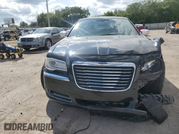 2012 Chrysler 300 with VIN 2C3CCAAGXCH176113, listed as a Copart auction lot 81804825 with 122,140 mi miles and Salvage title. Bid and sale history available at DreamBid. Image 5.