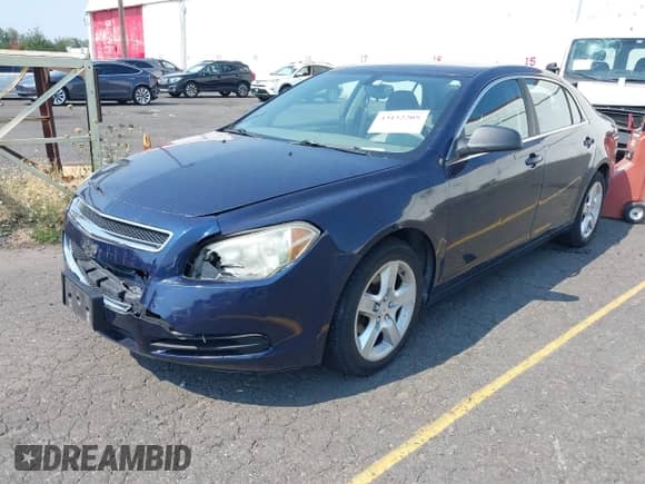 2010 Chevrolet Malibu 1LS with VIN 1G1ZB5EB1AF171999, listed as a IAAI auction lot 43152205 with 142,109 mi miles and . Bid and sale history available at DreamBid. Image 2.