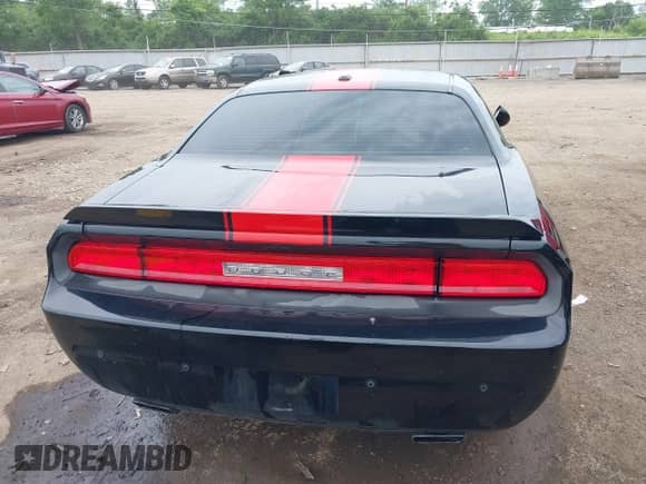 2013 Dodge Challenger SXT with VIN 2C3CDYAG1DH581784, listed as a IAAI auction lot 42263476 with 107,341 mi miles and . Bid and sale history available at DreamBid. Image 16.