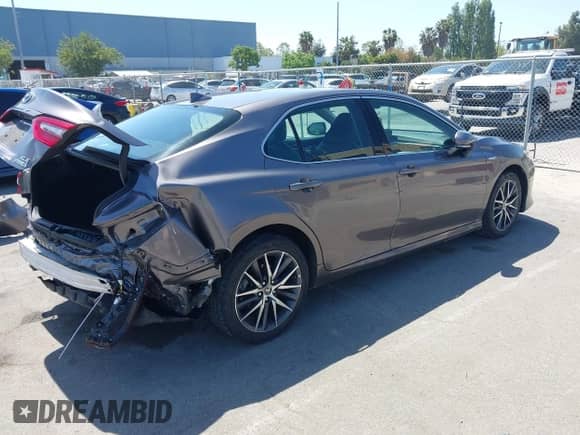 2021 Toyota Camry Hybrid XLE with VIN 4T1F31AK9MU560049, listed as a IAAI auction lot 42211169 with 182,185 mi miles and . Bid and sale history available at DreamBid. Image 4.