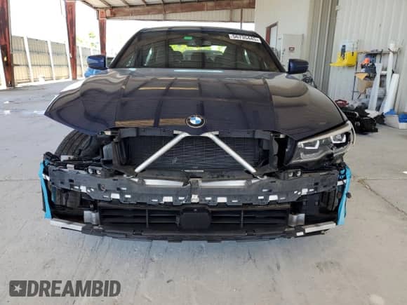 2021 BMW 3 Series 330e xDrive z VIN 3MW5P9J04M8B87501, wystawiony jako Copart lot #56735445 z przebiegiem 25 818 mil mil oraz Szkoda całkowita • Salvage title. Historia ofert i sprzedaży dostępna na DreamBid. Obrazek 5.