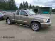 2006 Dodge Dakota SLT with VIN 1D7HW42K96S572291, listed as a Copart auction lot 64859254 with 147,527 mi miles and Clean title. Bid and sale history available at DreamBid. Image 4.