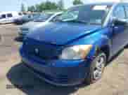 2009 Dodge Caliber SE with VIN 1B3HB28A39D161228, listed as a IAAI auction lot 42571522 with 188,428 mi miles and . Bid and sale history available at DreamBid. Image 6.