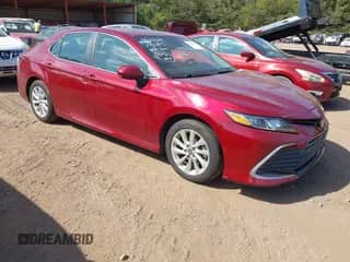 2021 Toyota Camry LE with VIN 4T1C11AK0MU526459, listed as a IAAI auction lot 43148735 with 89,112 mi miles and . Bid and sale history available at DreamBid. Image 1.