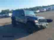 2022 Jeep Wrangler Unlimited Willys z VIN 1C4HJXDM9NW226080, wystawiony jako IAAI lot #43119592 z przebiegiem 59 039 mil mil oraz . Historia ofert i sprzedaży dostępna na DreamBid. Obrazek 1.