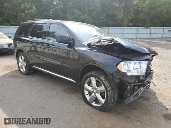 2013 Dodge Durango SXT with VIN 1C4RDHAG2DC683622, listed as a Copart auction lot 70213505 with 202,877 mi miles and Salvage title. Bid and sale history available at DreamBid. Image 4.