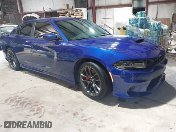 2021 Dodge Charger Scat Pack Widebody z VIN 2C3CDXGJ6MH675379, wystawiony jako IAAI lot #40803508 z przebiegiem 41 787 mil mil oraz . Historia ofert i sprzedaży dostępna na DreamBid. Obrazek 1.