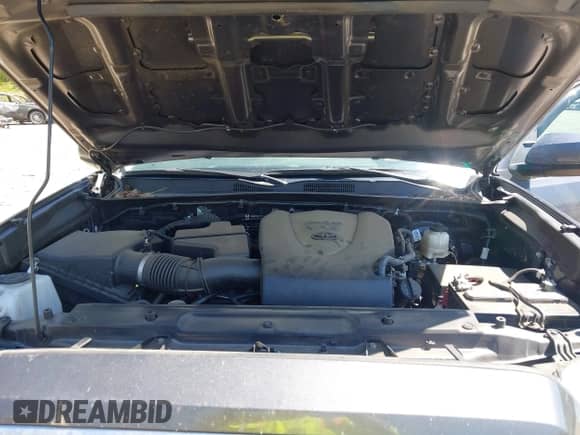 2021 Toyota Tacoma SR5 z VIN 5TFDZ5BN6MX059581, wystawiony jako IAAI lot #42051740 z przebiegiem 65 399 mil mil oraz . Historia ofert i sprzedaży dostępna na DreamBid. Obrazek 10.