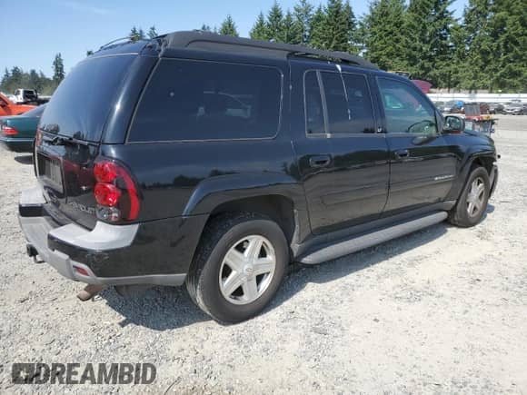 2003 Chevrolet TrailBlazer EXT LT z VIN 1GNET16S836143072, wystawiony jako Copart lot #60919665 z przebiegiem 150 946 mil mil oraz Szkoda całkowita • Salvage title. Historia ofert i sprzedaży dostępna na DreamBid. Obrazek 3.