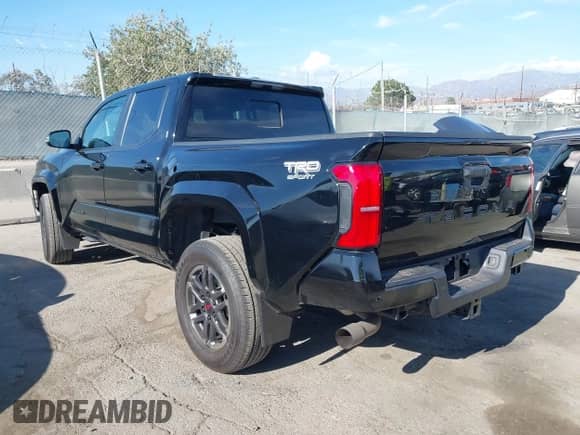 2024 Toyota Tacoma SR5 with VIN 3TMKB5FN3RM000779, listed as a IAAI auction lot 43081279 with 24,906 mi miles and . Bid and sale history available at DreamBid. Image 3.