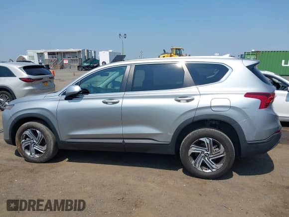 2023 Hyundai Santa Fe SE z VIN 5NMS1DAJ0PH588965, wystawiony jako IAAI lot #42994113 z przebiegiem 15 875 mil mil oraz . Historia ofert i sprzedaży dostępna na DreamBid. Obrazek 14.