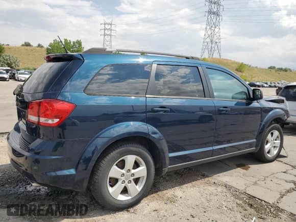2014 Dodge Journey SE с VIN 3C4PDDAG1ET226676, выставлен на аукционе Copart как лот 65282055 с пробегом 89 351 миль миль и Списание • Salvage title. История ставок и продаж доступна на DreamBid. Изображение 3.