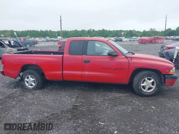 1998 Dodge Dakota SLT z VIN 1B7GL22X0WS741550, wystawiony jako IAAI lot #42176163 z przebiegiem 85 252 mil mil oraz . Historia ofert i sprzedaży dostępna na DreamBid. Obrazek 13.