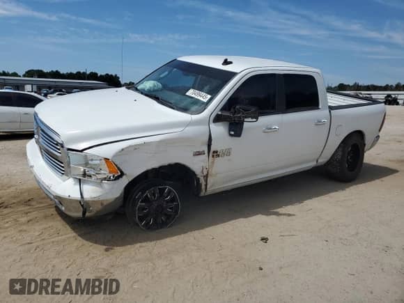 2017 Ram 1500 Big Horn z VIN 3C6RR7LT1HG523117, wystawiony jako Copart lot #70499445 z przebiegiem 106 796 mil mil oraz Szkoda całkowita • Salvage title. Historia ofert i sprzedaży dostępna na DreamBid. Obrazek 1.