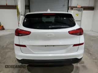 2019 Hyundai Tucson SE z VIN KM8J23A48KU904333, wystawiony jako Copart lot #87366975 z przebiegiem 118 880 mil mil oraz Szkoda całkowita • Salvage title. Historia ofert i sprzedaży dostępna na DreamBid. Obrazek 6.