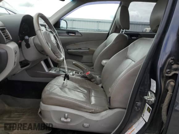 2011 Subaru Forester z VIN JF2SHBHC7BH719649, wystawiony jako Copart lot #57782065 z przebiegiem 241 157 mil mil oraz Szkoda całkowita • Salvage title. Historia ofert i sprzedaży dostępna na DreamBid. Obrazek 7.