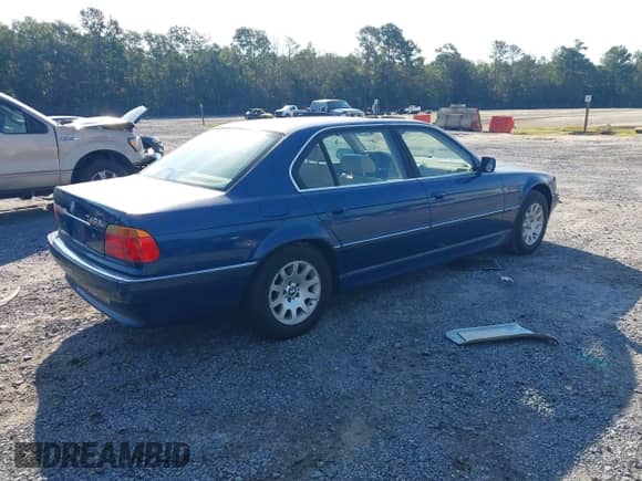 2000 BMW 7 Series 740iL with VIN WBAGH8348YDP09099, listed as a IAAI auction lot 43078448 with 288,396 mi miles and . Bid and sale history available at DreamBid. Image 4.