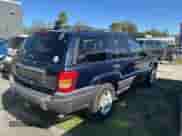2004 Jeep Grand Cherokee Laredo z VIN 1J4GX48N24C436753, wystawiony jako Copart lot #88142905 z przebiegiem 114 022 mil mil oraz Czysty tytuł • Clean title. Historia ofert i sprzedaży dostępna na DreamBid. Obrazek 4.