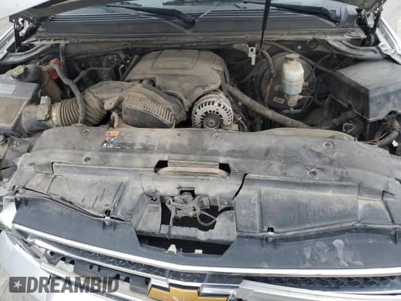 2014 Chevrolet Suburban LT with VIN 1GNSCJE04ER202588, listed as a Copart auction lot 70341285 with 167,300 mi miles and Salvage title. Bid and sale history available at DreamBid. Image 12.