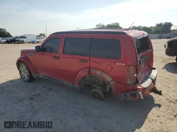 2011 Dodge Nitro Heat with VIN 1D4PU4GK5BW576896, listed as a Copart auction lot 62063805 with 131,492 mi miles and Salvage title. Bid and sale history available at DreamBid. Image 2.