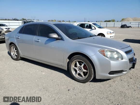 2010 Chevrolet Malibu 1LS с VIN 1G1ZB5EB6A4123071, выставлен на аукционе Copart как лот 80544305 с пробегом 165 577 миль миль и Списание • Salvage title. История ставок и продаж доступна на DreamBid. Изображение 4.