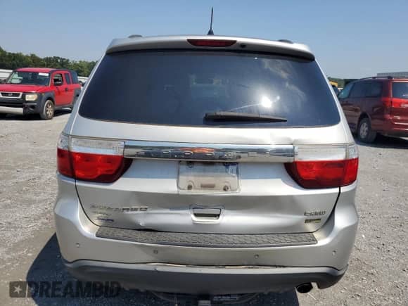 2011 Dodge Durango Crew z VIN 1D4RE4GG3BC625418, wystawiony jako Copart lot #68473315 z przebiegiem 178 530 mil mil oraz Szkoda całkowita • Salvage title. Historia ofert i sprzedaży dostępna na DreamBid. Obrazek 6.