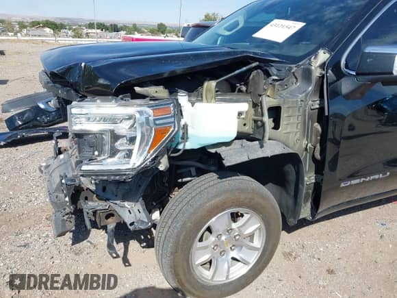 2021 GMC Sierra 1500 Denali z VIN 3GTU9FETXMG422324, wystawiony jako IAAI lot #43121547 z przebiegiem 55 757 mil mil oraz . Historia ofert i sprzedaży dostępna na DreamBid. Obrazek 18.