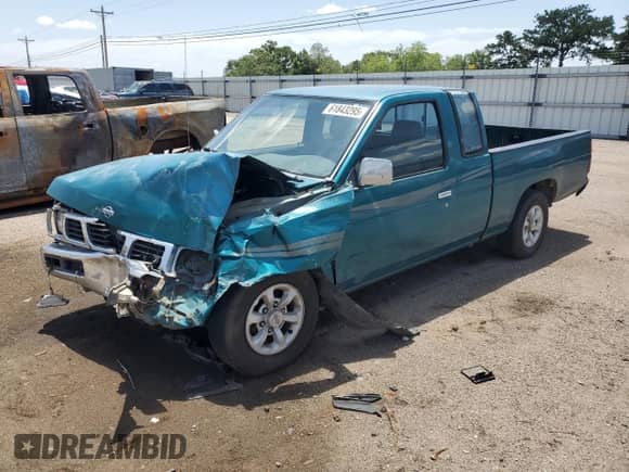 1997 Nissan Frontier XE with VIN 1N6SD16S9VC339998, listed as a Copart auction lot 61843295 with 371,449 mi miles and Salvage title. Bid and sale history available at DreamBid. Image 1.