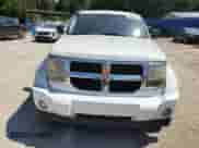 2011 Dodge Nitro SE z VIN 1D4PT2GK6BW595285, wystawiony jako Copart lot #80345735 z przebiegiem 168 147 mil mil oraz Szkoda całkowita • Salvage title. Historia ofert i sprzedaży dostępna na DreamBid. Obrazek 5.