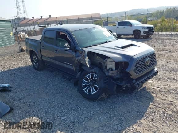 2021 Toyota Tacoma SR with VIN 3TYCZ5AN0MT027247, listed as a IAAI auction lot 43234020 with 26,058 mi miles and . Bid and sale history available at DreamBid. Image 1.