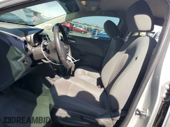 2013 Chevrolet Sonic LT с VIN 1G1JC6SB5D4235532, выставлен на аукционе Copart как лот 63789535 с пробегом 64 072 миль миль и Списание • Salvage title. История ставок и продаж доступна на DreamBid. Изображение 7.