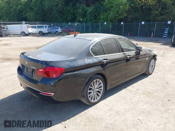 2015 BMW 5 Series 528i xDrive with VIN WBA5A7C52FD620771, listed as a IAAI auction lot 42953855 with 151,283 mi miles and . Bid and sale history available at DreamBid. Image 4.