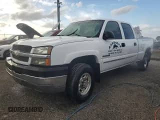 2003 Chevrolet Silverado 2500HD LS z VIN 1GCHC23U63F160504, wystawiony jako Copart lot #74484684 z przebiegiem 142 716 mil mil oraz Nie do naprawy • Non repairable. Historia ofert i sprzedaży dostępna na DreamBid. Obrazek 1.