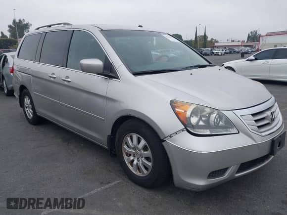 2008 Honda Odyssey EX z VIN 5FNRL38488B416785, wystawiony jako IAAI lot #43306250 z przebiegiem 160 597 mil mil oraz . Historia ofert i sprzedaży dostępna na DreamBid. Obrazek 1.