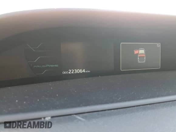 2017 Toyota Prius Premium z VIN JTDKARFP2H3032635, wystawiony jako Copart lot #71489765 z przebiegiem 223 064 mil mil oraz Szkoda całkowita • Salvage title. Historia ofert i sprzedaży dostępna na DreamBid. Obrazek 9.