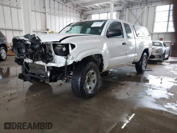 2018 Toyota Tacoma SR with VIN 5TFRX5GN9JX122396, listed as a IAAI auction lot 42933585 with 107,492 mi miles and . Bid and sale history available at DreamBid. Image 17.