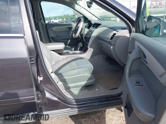 2013 Chevrolet Traverse LT z VIN 1GNKRGKDXDJ106308, wystawiony jako IAAI lot #42617918 z przebiegiem 80 823 mil mil oraz . Historia ofert i sprzedaży dostępna na DreamBid. Obrazek 5.