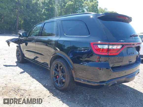 2024 Dodge Durango SRT 392 Plus with VIN 1C4SDJGJ8RC154212, listed as a IAAI auction lot 42712350 with 1,261 mi miles and . Bid and sale history available at DreamBid. Image 3.