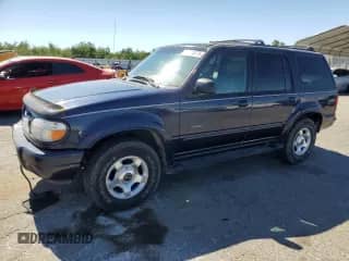 2000 Ford Explorer Limited with VIN 1FMDU75E0YZA21422, listed as a Copart auction lot 63618475 with 141,942 mi miles and Salvage title. Bid and sale history available at DreamBid. Image 1.
