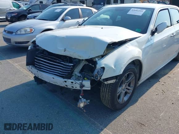 2012 Chrysler 300 с VIN 2C3CCAAG9CH208002, выставлен на аукционе IAAI как лот 42685204 с пробегом 126 311 миль миль и . История ставок и продаж доступна на DreamBid. Изображение 6.