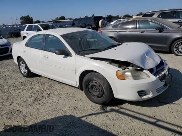 2005 Dodge Stratus SXT with VIN 1B3EL46X05N558208, listed as a Copart auction lot 71926795 with 111,312 mi miles and Salvage title. Bid and sale history available at DreamBid. Image 4.