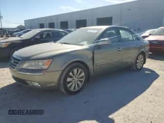 2010 Hyundai Sonata SE PZEV with VIN 5NPEU4AC1AH624355, listed as a Copart auction lot 90017605 with 65,915 mi miles and Salvage title. Bid and sale history available at DreamBid. Image 1.