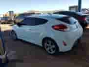 2013 Hyundai Veloster w/Black Int z VIN KMHTC6AD5DU147868, wystawiony jako Copart lot #81929665 z przebiegiem 139 774 mil mil oraz Czysty tytuł • Clean title. Historia ofert i sprzedaży dostępna na DreamBid. Obrazek 2.