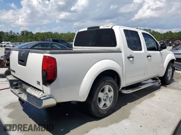 2006 Nissan Frontier LE с VIN 1N6AD07U06C430374, выставлен на аукционе Copart как лот 59904785 с пробегом 257 298 миль миль и Списание • Salvage title. История ставок и продаж доступна на DreamBid. Изображение 3.