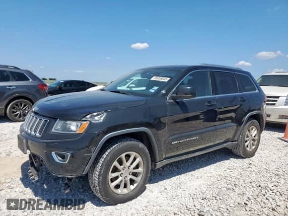 2016 Jeep Grand Cherokee Laredo with VIN 1C4RJEAG0GC415616, listed as a Copart auction lot 69056645 with 113,617 mi miles and Clean title. Bid and sale history available at DreamBid. Image 1.