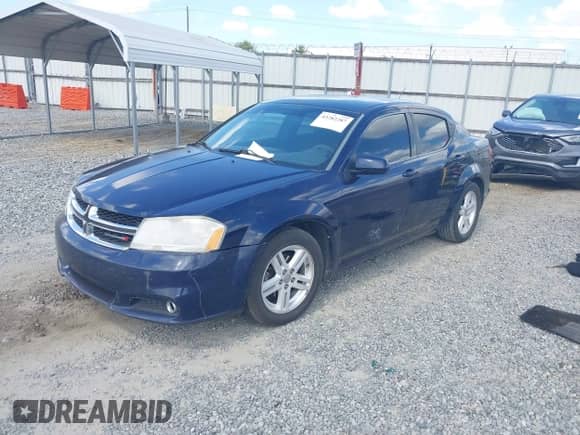 2013 Dodge Avenger SXT with VIN 1C3CDZCBXDN615817, listed as a IAAI auction lot 43282287 with 245,259 mi miles and . Bid and sale history available at DreamBid. Image 17.