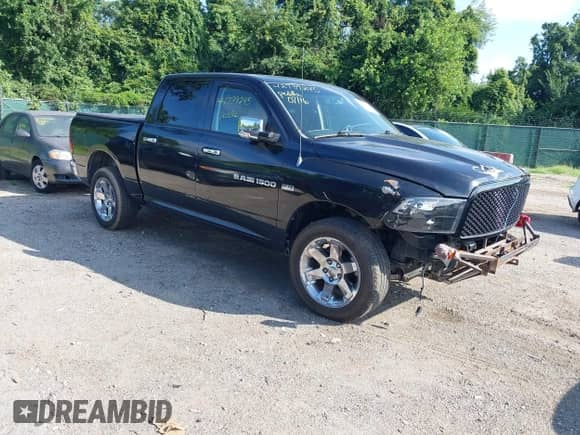 2011 Ram 1500 Big Horn with VIN 1D7RV1CT6BS516123, listed as a IAAI auction lot 42739245 with 229,003 mi miles and . Bid and sale history available at DreamBid. Image 1.
