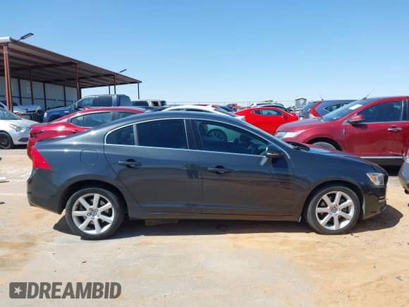 2016 Volvo S60 T5 Drive-E Premier z VIN YV126MFK4G2409957, wystawiony jako IAAI lot #41993257 z przebiegiem 102 420 mil mil oraz . Historia ofert i sprzedaży dostępna na DreamBid. Obrazek 13.